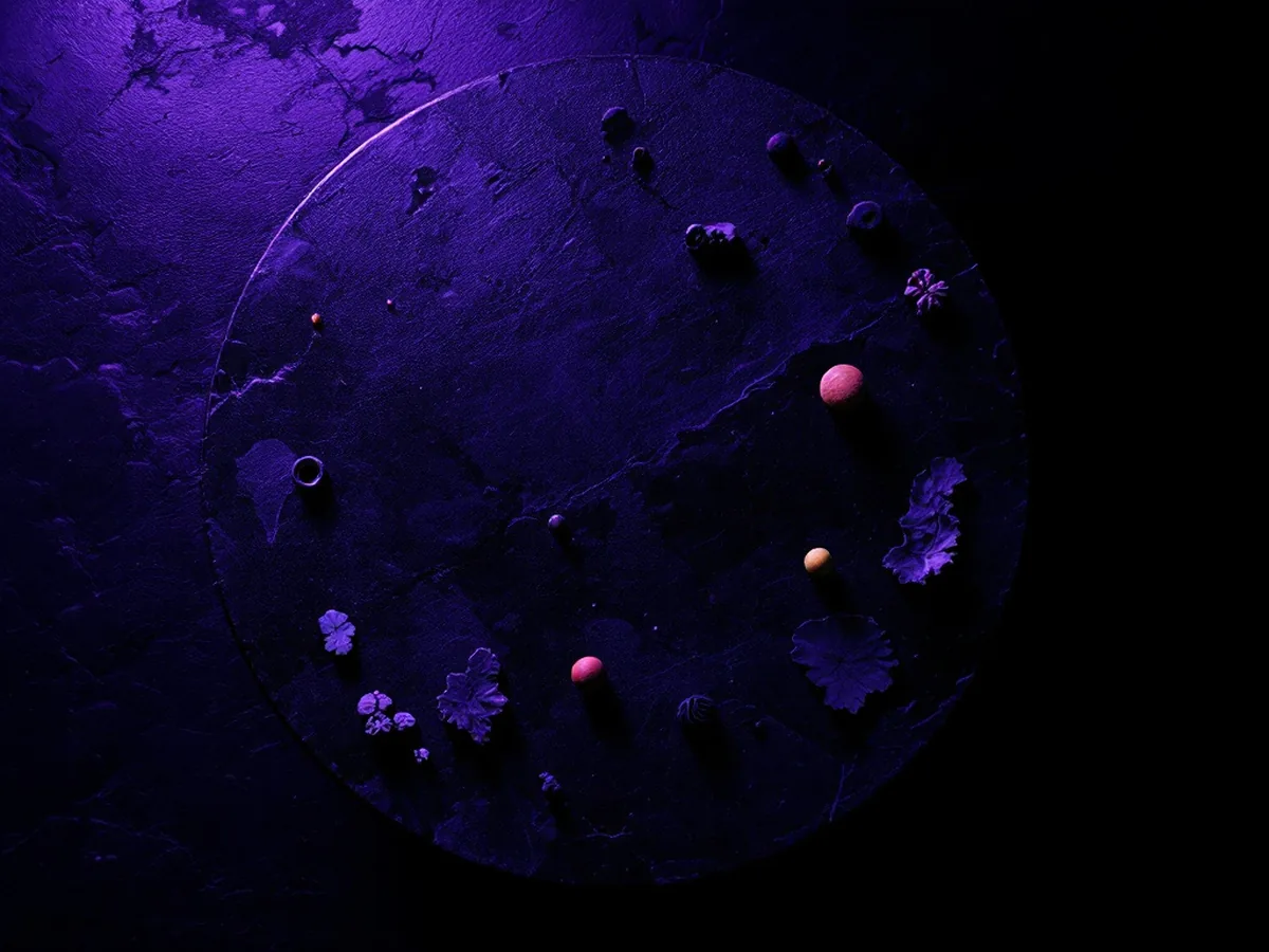 Abstract tokens arranged on a round table surface